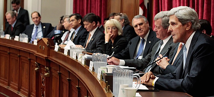 Bi-partisan and bi-cameral members of the Joint Select Committee on Deficit Reduction listen to the opening statement of Sen. John Kerry (D-MA) (R) during their first hearing on Capitol Hill September 8, 2011 in Washington, DC. This was the first meeting of the so-called 'Super Committee' formed to make further cuts in the U.S. deficit. (Chip Somodevilla/Getty Images) Bi-partisan and bi-cameral members of the Joint Select Committee on Deficit Reduction listen to the opening statement of Sen. John Kerry (D-MA) (R) during their first hearing on Capitol Hill September 8, 2011 in Washington, DC. This was the first meeting of the so-called 'Super Committee' formed to make further cuts in the U.S. deficit. (Chip Somodevilla/Getty Images)