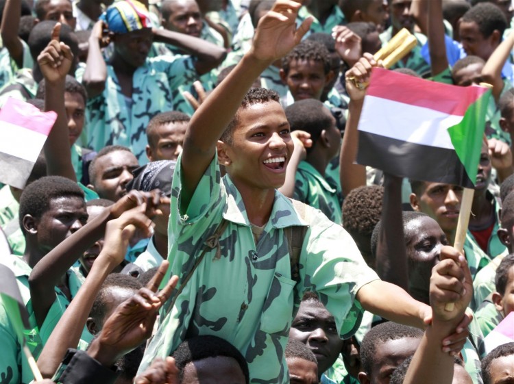 Hundreds of members of Khartoum's student union demonstrate against the Sudan People's Liberation Movement (SPLM) outside the Republican Palace in the Sudanese capital on Sept. 5. The ruling National Congress Party in Khartoum accuses SPLM of inflaming the conflicts along the border regions of Abyei, Southern Kordofan, and Blue Nile state. (Ashraf Shazly/AFP/Getty Images)