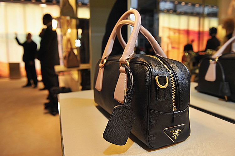 A Prada handbag is pictured here at the Prada Fifth Avenue store in New York City, Sept. 8. The company announced yesterday that its half-year profit jumped by 74 percent. (Slaven Vlasic/Getty Images for Prada)
