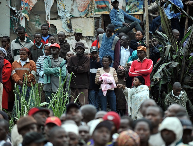 Residents of a shantee in Nairobi react to an oil pipeline explosion on September 12, 2011. (Tony Karumba/AFP/Getty Images) Residents of a shantee in Nairobi react to an oil pipeline explosion on September 12, 2011. (Tony Karumba/AFP/Getty Images)