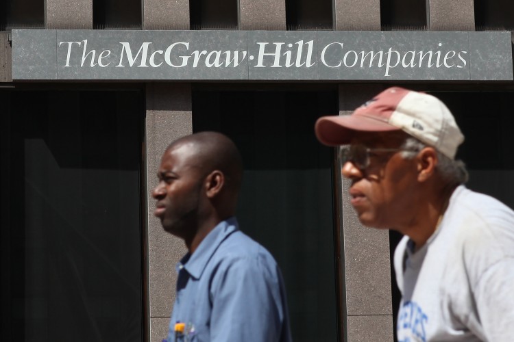 Pedestrians walk by the McGraw-Hill headquarters on September 12, 2011 in New York City. (Justin Sullivan/Getty Images)