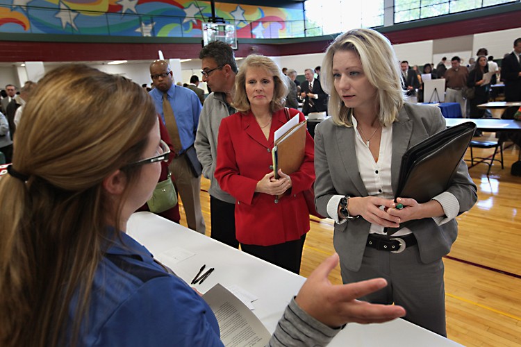 Jaclyn Weitzenfeld (R) speaks with a human resources representative from a casino during a job fair hosted by Illinois State Senator Dan Kotowski and the Illinois Department of Employment Security on Sept. 15 in Park Ridge, Illinois. (Scott Olson/Getty Images) Jaclyn Weitzenfeld (R) speaks with a human resources representative from a casino during a job fair hosted by Illinois State Senator Dan Kotowski and the Illinois Department of Employment Security on Sept. 15 in Park Ridge, Illinois. (Scott Olson/Getty Images)