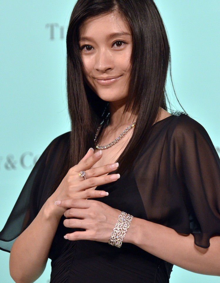 Japanese actress Ryoko Shinohara wears a total of $3 million worth of diamond jewelry at a reception for Tiffany's bridal jewelry collection in Tokyo in September. Japan is the single largest market for luxury goods, behind the U.S. (Yoshikazu Tsuno/Getty Images )