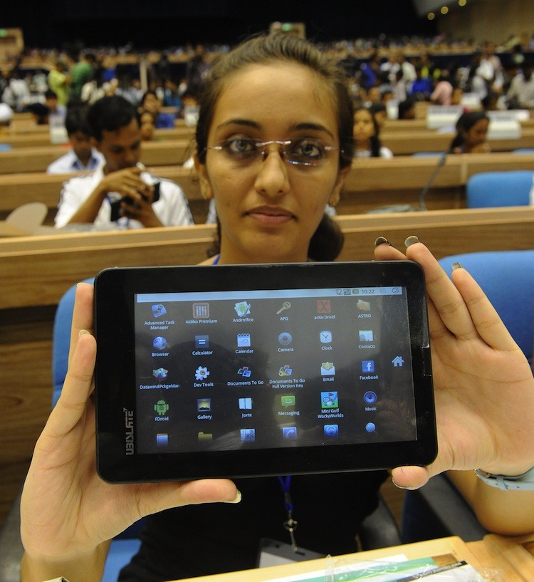 Indian student Sandhaya Nanjani poses with the 'Aakash' $35 tablet computer after its launch in New Delhi, Oct. 5. (Prakash Singh/Getty Images) Indian student Sandhaya Nanjani poses with the 'Aakash' $35 tablet computer after its launch in New Delhi, Oct. 5. (Prakash Singh/Getty Images)
