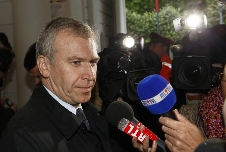 Outgoing Belgium Prime Minister Yves Leterme talks to the press before a special Kern meeting, a restricted ministers meeting, on Dexia bank in Brussels on Oct. 9. (Bruno Fahy/Getty Images )