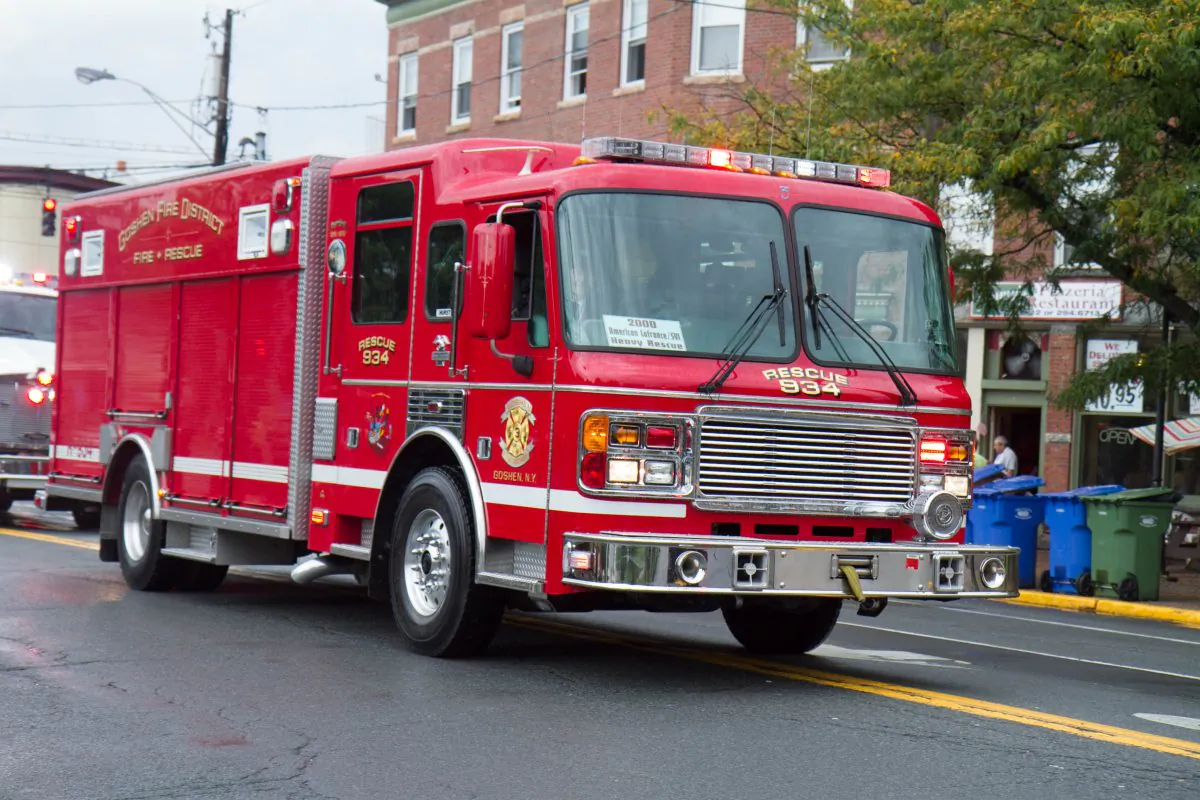 A 2000 American LaFrance heavy rescue truck from the Goshen Fire District in the Triennial Fire Parade in Goshen on Sept. 12, 2015. (Holly Kellum/Epoch Times)