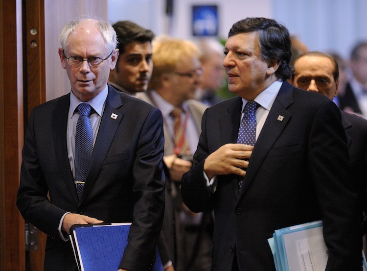 European Council President Herman Van Rompuy (L) and European Commission President Jose Manuel Barroso arrive to a working session as part of the eurozone summit held at EU headquarters in Brussels on Oct. 26. (Eric Feferberg/Getty Images )