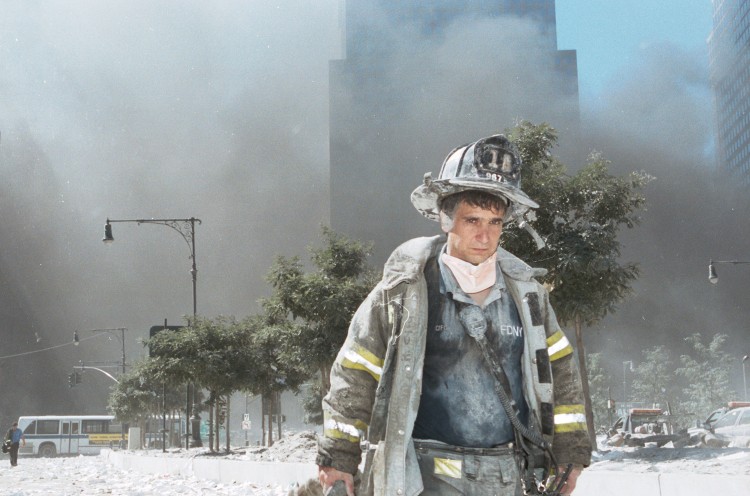 An unidentified New York City firefighter walks away from Ground Zero after the collapse of the Twin Towers September 11, 2001 in New York City. As the 10-year anniversary arrives, the best way to remember the events may be with service to the larger community. (Anthony Correia/Getty Images) An unidentified New York City firefighter walks away from Ground Zero after the collapse of the Twin Towers September 11, 2001 in New York City. As the 10-year anniversary arrives, the best way to remember the events may be with service to the larger community. (Anthony Correia/Getty Images)