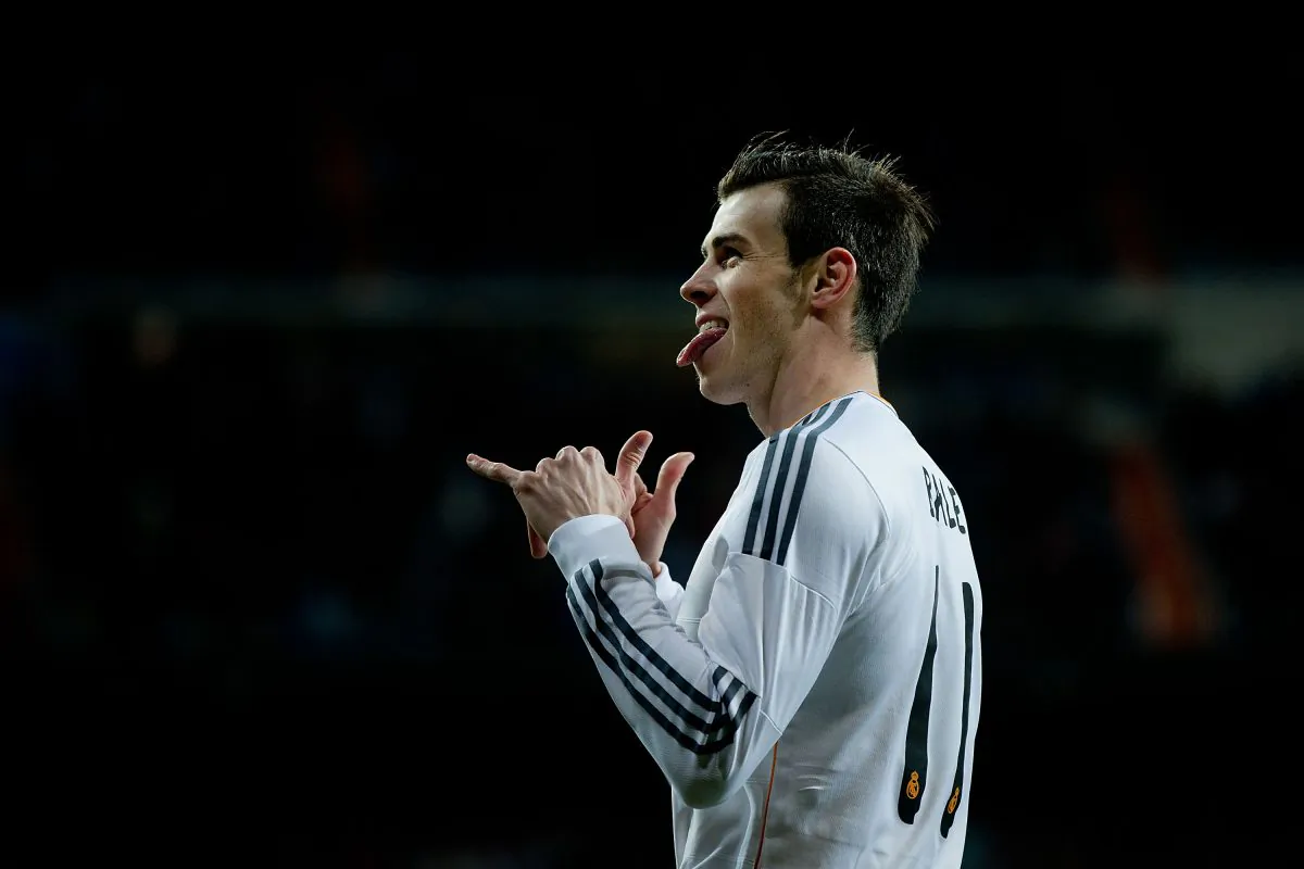 Gareth Bale of Real Madrid CF shows his tounge celebrating scoring their opening goal during the La Liga match between Real Madrid CF and Villarreal CF at Estadio Santiago Bernabeu on February 8, 2014 in Madrid, Spain. (Photo by Gonzalo Arroyo Moreno/Getty Images)