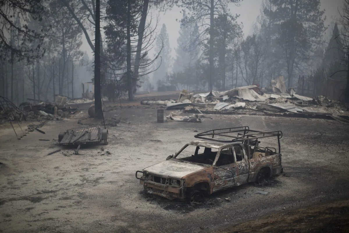 SAN ANDREAS, CA - SEPTEMBER 13: A burned truck and structures are seen at the Butte Fire on September 13, 2015 near San Andreas, California. California governor Jerry Brown has declared a state of emergency in Amador and Calaveras counties where the 100-square-mile wildfire has burned scores of structures so far and is threatening 6,400 in the historic Gold Country of the Sierra Nevada foothills. (Photo by David McNew/Getty Images)