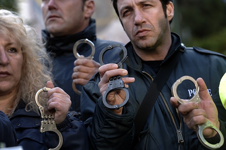Policemen attend a demonstration of Gree Epoch Times Photo