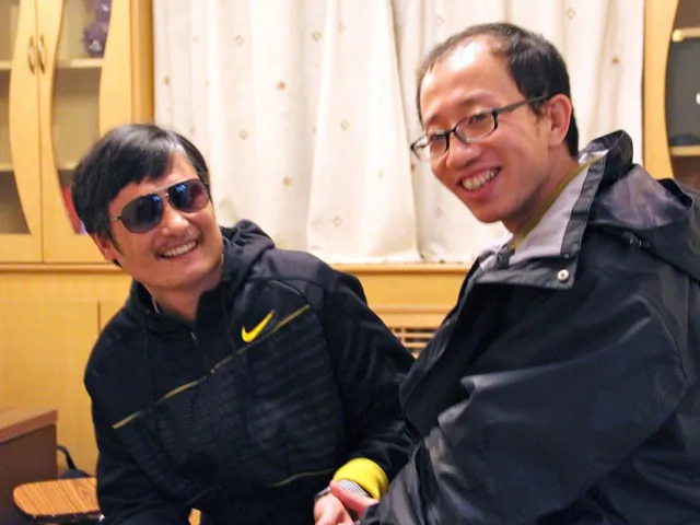 This undated photo shows outspoken government critic Hu Jia (R) with blind lawyer Chen Guangcheng after Chen's escape, at an undisclosed location in Beijing. (STR/AFP/Getty Images) 