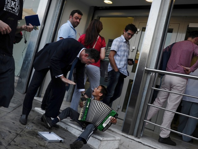 143661952 People line up outside a Greek bank