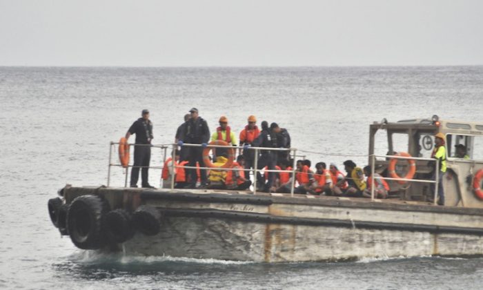 Rescuers are searching for survivors off the coast of Christmas Island after a boat carrying suspected asylum seekers capsized on June 22, 2012. (Scott Fisher/Getty Images)