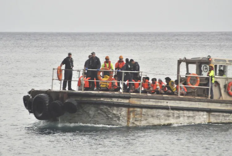 Rescuers are searching for survivors off the coast of Christmas Island after a boat carrying suspected asylum seekers capsized on June 22, 2012. (Scott Fisher/Getty Images)