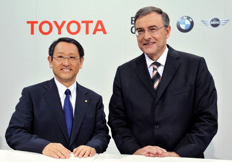 Japan's Toyota President Akio Toyoda (L)