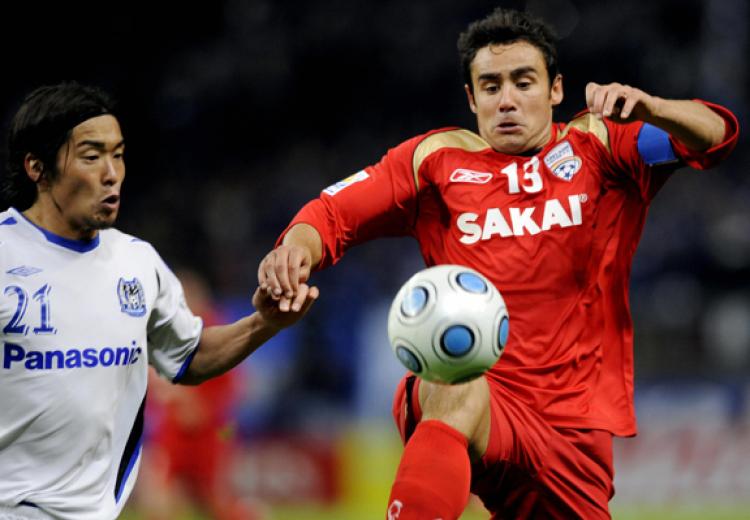 Adelaide United captain and midfielder Travis Dodd (R) and Gamba Osaka defender Akira Kaji (L) during the quarter-final match in the FIFA Club World Cup 2008 at the Toyota stadium in Toyota, Aichi prefecture, Japan, last Sunday December 14. (TOSHIFUMI KITAMURA/AFP/Getty Images) Adelaide United captain and midfielder Travis Dodd (R) and Gamba Osaka defender Akira Kaji (L) during the quarter-final match in the FIFA Club World Cup 2008 at the Toyota stadium in Toyota, Aichi prefecture, Japan, last Sunday December 14. (TOSHIFUMI KITAMURA/AFP/Getty Images)