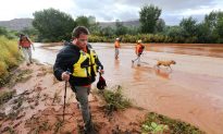 Floodwaters Trap Hikers, Carry Away Cars in Utah, Killing 16