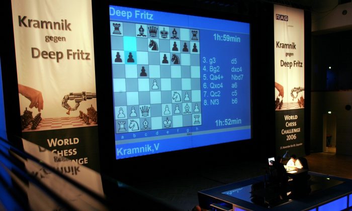 Chess World Champion Vladimir Kramnik (Russia) concentrates on the podium during his match against German chess computer Deep Fritz on November 29, 2006 in Bonn, Germany. (Juergen Schwarz/Bongarts/Getty Images)