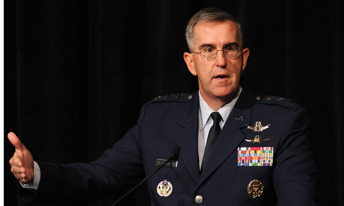 Lieutenant General John E. Hyten, Air Force Space Command vice commander, speaks about how cyber operations are a clear catalyst for change in the art and science of modern warfare during the Space Foundation's Cyber 1.3 luncheon at The Broadmoor hotel, Colorado Springs, Colo., April 8. (U.S. Air Force photo/Duncan Wood)