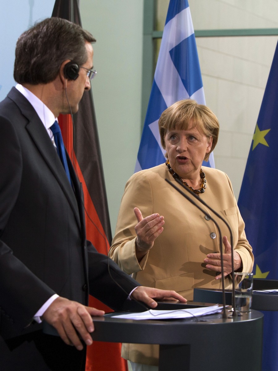 GERMANY-GREECE-FINACE-PUBLIC-DEBT German Chancellor Angela Merkel (R) and Greek Prime Minister Antonis Samaras give a press conference on Aug. 24 at the Chancellery in Berlin. Pete Gannon/AFP/Getty Images