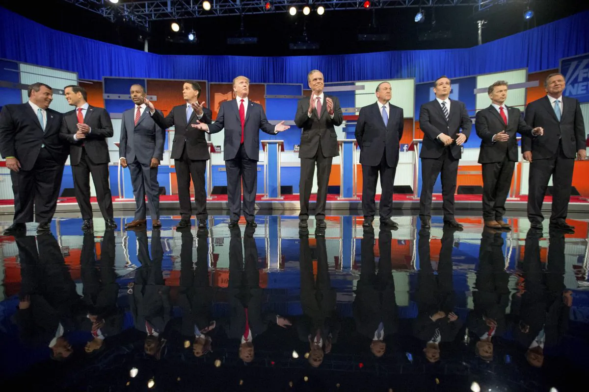 Republican presidential candidates from left, Chris Christie, Marco Rubio, Ben Carson, Scott Walker, Donald Trump, Jeb Bush, Mike Huckabee, Ted Cruz, Rand Paul, and John Kasich take the stage for the first Republican presidential debate in Cleveland on Aug. 6. (AP Photo/Andrew Harnik, File)