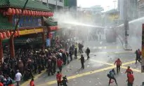 Malaysian Police Fire Water Cannons at Malay Protesters