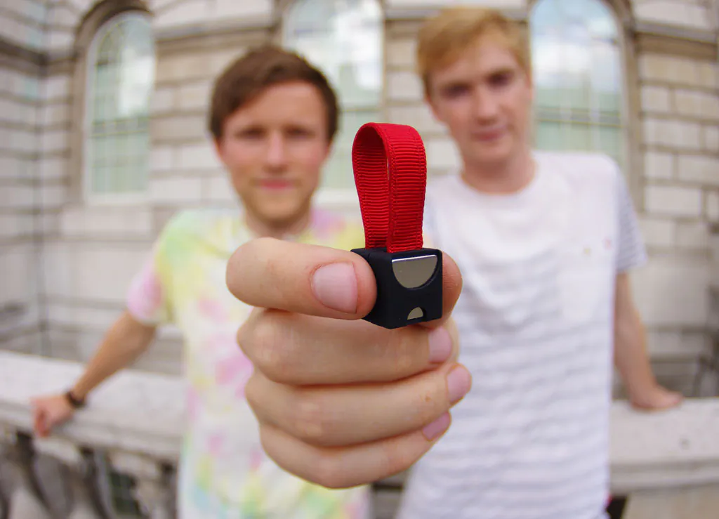 The founders of Design on Impulse show off the Nipper. (Design on Impulse)