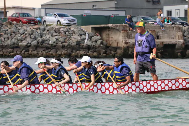 Norm Gok steers at the annual San Francisco International Dragon Boat Festival on Treasure Island in 2014. “It’s much more than just an individual thing. Dragon boating is a real team sport. Everybody has to function together,” Gok said. (Courtesy of Jeremy Wong)