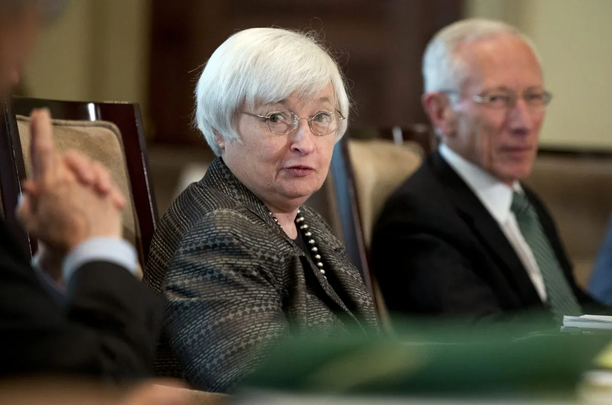 Federal Reserve Chair Janet Yellen (L) with Vice Chairman Stanley Fischer, and the board of governors of the Federal Reserve System, presides over a meeting in Washington, on July 20, 2015. (Manuel Balce Ceneta/AP)
