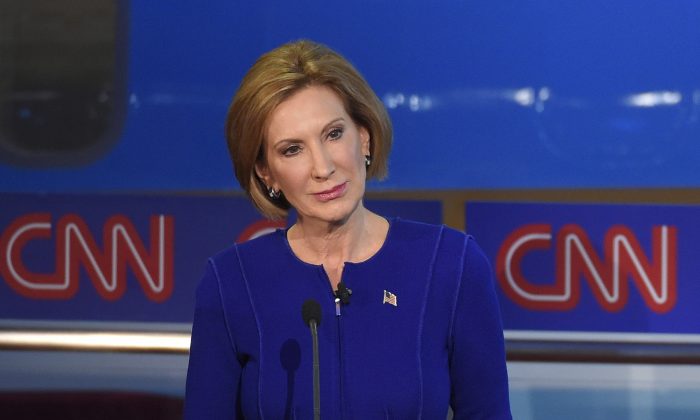 Republican presidential candidate, businesswoman Carly Fiorina stands during the CNN Republican presidential debate at the Ronald Reagan Presidential Library and Museum on Wednesday, Sept. 16, 2015, in Simi Valley, Calif. (AP Photo/Mark J. Terrill)