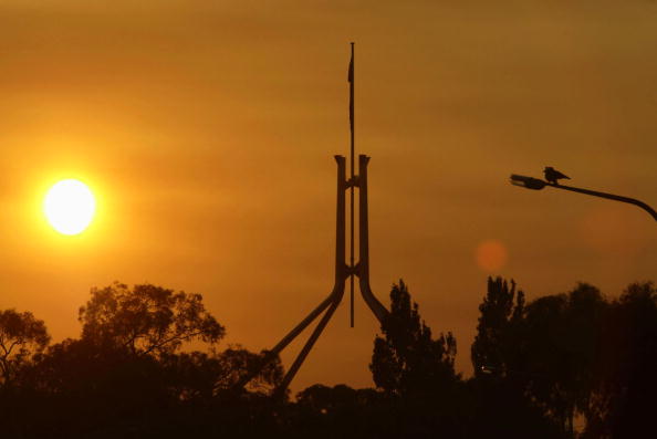 The sun rises over Parliament House Epoch Times Photo