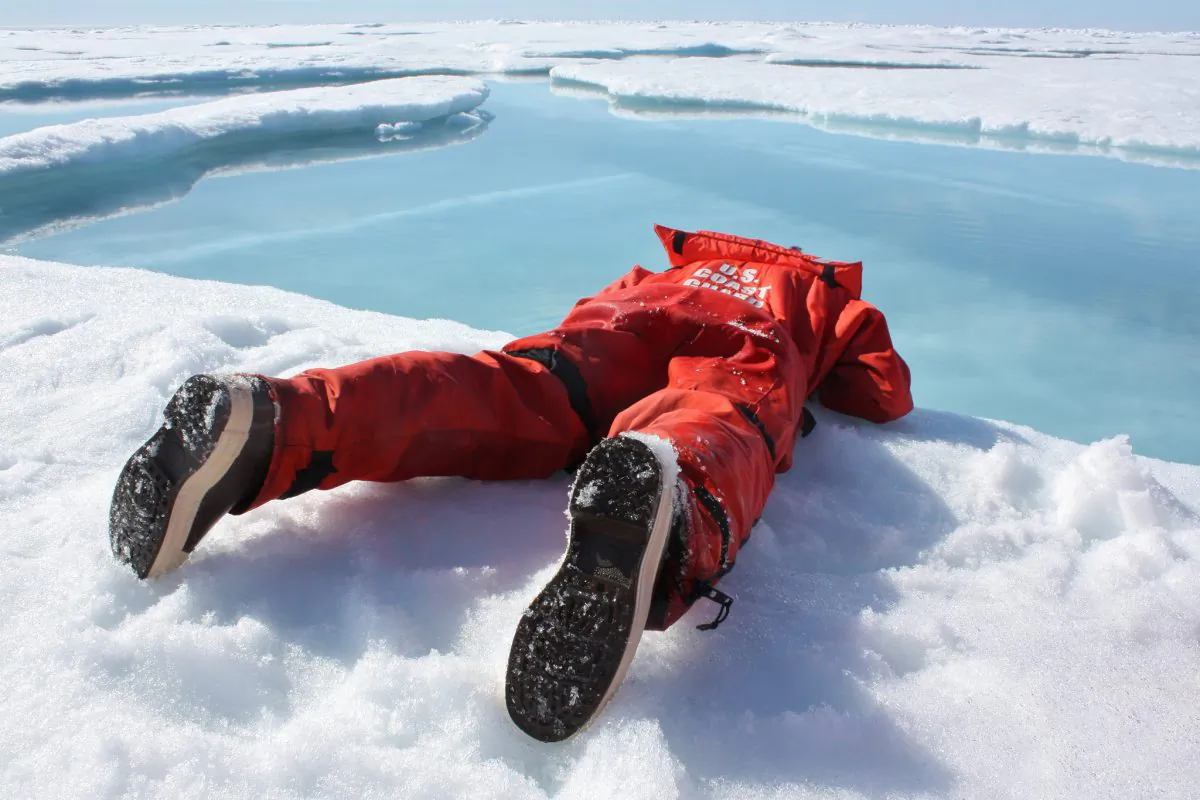Above, a scientist sips freshwater from an Arctic meltpond. (Kathryn Hansen/NASA via NASA Goddard Space Flight Center)