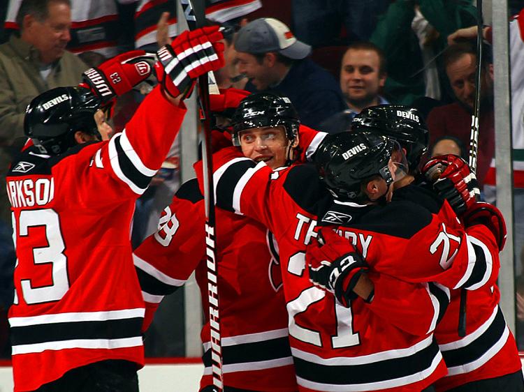 LIGHTING IT UP: After a sluggish start, the New Jersey Devils roared back to defeat the Atlanta Thrashers Tuesday night at the Prudential Center. (Bruce Bennett/Getty Images) LIGHTING IT UP: After a sluggish start, the New Jersey Devils roared back to defeat the Atlanta Thrashers Tuesday night at the Prudential Center. (Bruce Bennett/Getty Images)