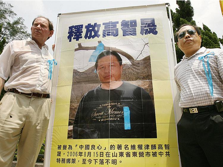 Edward McMillan-Scott (L) Vice President, European Parliament and Democracy Legislator Albert Ho seek justice for jailed human rights lawyer Gao Zhisheng in Hong Kong, 26 August 2006. Gao has been in prison on and off since 2006, and has now 'disappeared' while in custody. (Mike Clarke/AFP/Getty Images) Edward McMillan-Scott (L) Vice President, European Parliament and Democracy Legislator Albert Ho seek justice for jailed human rights lawyer Gao Zhisheng in Hong Kong, 26 August 2006. Gao has been in prison on and off since 2006, and has now 'disappeared' while in custody. (Mike Clarke/AFP/Getty Images)