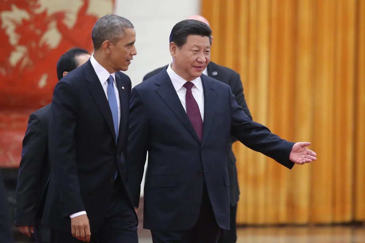 Chinese President Xi Jinping (R) and U.S. President Barack Obama (L) attend a welcoming ceremony inside the Great Hall of the People on November 12, 2014 in Beijing, China. (Feng Li/Getty Images)