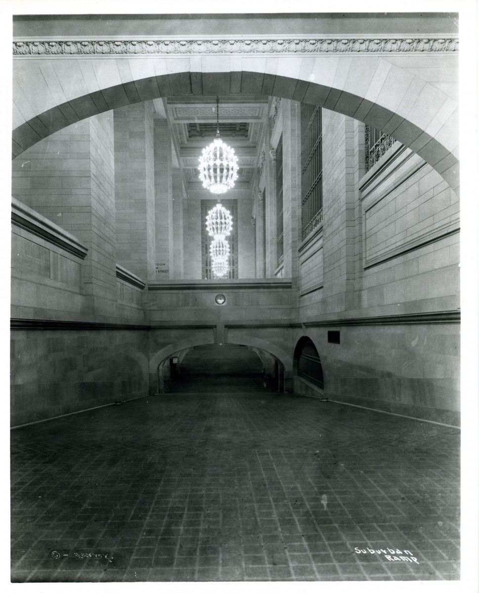 A ramp leads down to the lower level concourse in Grand Central Terminal in an undated photo. Ramps became key to keeping the terminal from getting crowded as they allow for smooth movement of large crowds and baggage. (Courtesy of MTA/MetroNorth Railroad)