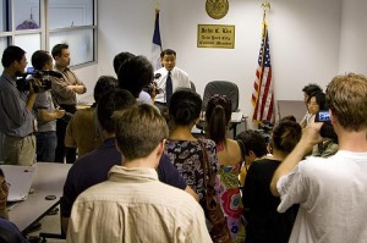 NYC Councilmember John Liu in his Flushing office talks to media before opening his office to constituents who wanted to appeal. He turned away a number of Falun Gong practitioners who had been trying to see him for weeks, yet ushered in several people who had been arrested in connection with violence against Falun Gong. (Edward Dai/Epoch Times)