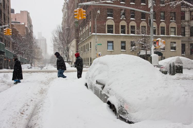 New Yorkers try to make their way about the city Friday morning amidst the third major snow storm of the season. (Jan Jekielek/Epoch Times) New Yorkers try to make their way about the city Friday morning amidst the third major snow storm of the season. (Jan Jekielek/Epoch Times)