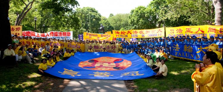 Falun Gong practitioners from across Canada gathered in Toronto on Sunday to hold a rally and a parade aimed at raising awareness about the persecution of their belief in mainland China. (Evan Ning/The Epoch Times)
