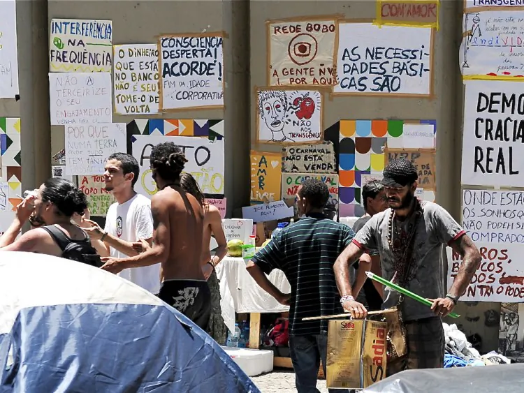 Young Brazilians set an encampment at Cinelandia Square in Rio de Janeiro, Brazil, on Oct. 26, 2011. Inspired in the 'indignant' protest held in Spain and Wall Street, the activists of the "Occupy Rio" movement are camping in protest. (Vanderlei Almeida/AFP/Getty Images)