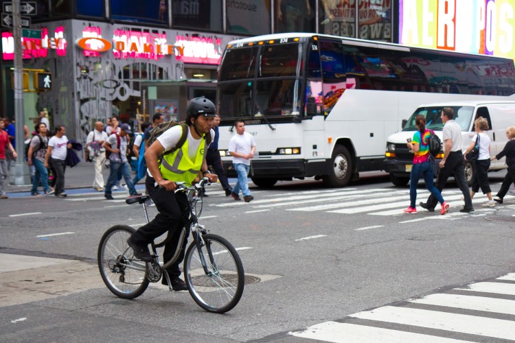 20120611_Biking+Tms+SQ_Chasteen_IMG_5880 A cyclist crosses Seventh Avenue while riding on 44th Street in Times Square