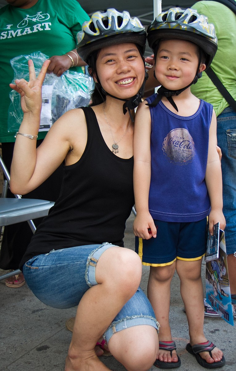 20120620_Bikeshare+Program_Chasteen_IMG_7372 A mother and her son at the Bikeshare Demonstration in Chinatown