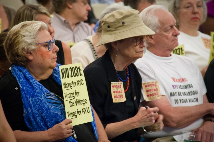Opponents of the New York University expansion in Greenwich Village at a City Council hearing in July. After the council passed the plan a week later some of the opponents sued the city over the plan. (Zachary Stieber/The Epoch Times)
