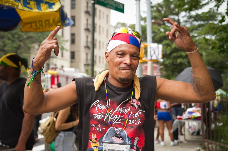 20120903Giboyeaus+ParadeBenC_7982 Wilfiedo Giboyeaus dances to music at New York's West Indian Day Carnival in Brooklyn, Sept. 3. (Benjamin Chasteen/The Epoch Times)
