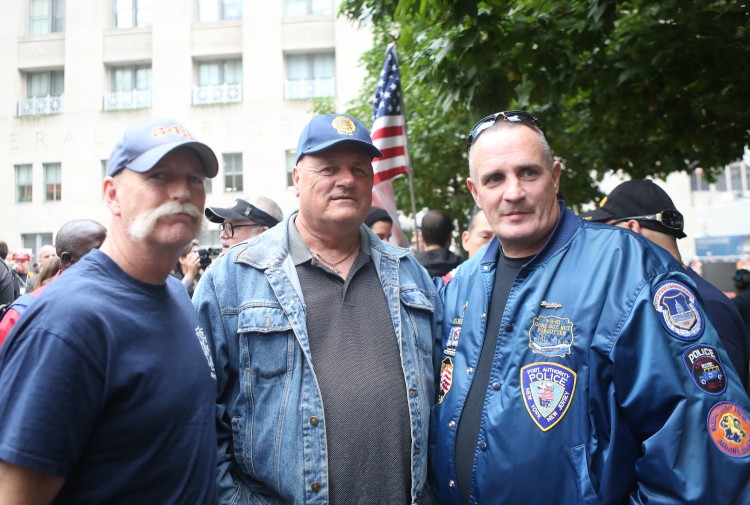 L-R: First responders Jim Preston, Joseph Zadroga, and T.J. Gilmartin at an event calling on the federal government to protect the Zadroga funds from looming sequester cuts. Joseph Zadroga is the father of James Zadroga, whom the bill is named after. James, a police detective, was the first person whose death was attributed to toxins inhaled while responding to the 9/11 attacks. (Gary Du/The Epoch Times)