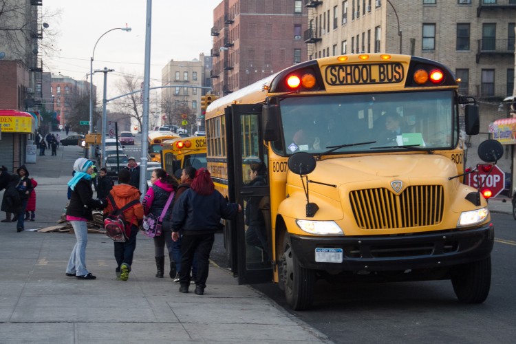 20130109School+bus+students_BenC_2232-Students exit a school bus in front of their school in the Bronx on Jan. 9, 2013. Looks like these students will have to find other ways to get to school, come this Wednesday morning. (Benjamin Chasteen/The Epoch Times) Students exit a school bus in front of their school in the Bronx on Jan. 9, 2013. Looks like these students will have to find other ways to get to school, come this Wednesday morning. (Benjamin Chasteen/The Epoch Times)