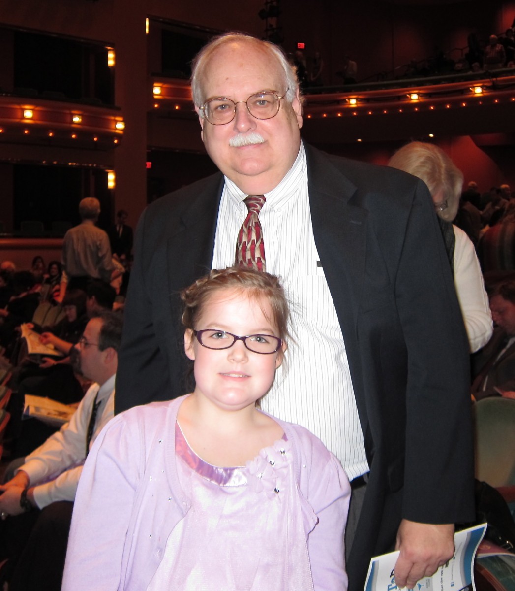 20130208_Cincinnati_ValerieAvore_ThomasBlust_Ret.Asst.Prosecutor_Shaylee+Wilson Thomas Blust and his granddaughter enjoy an evening at Shen Yun