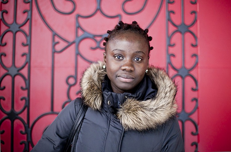 Bintou Kamara, 21, Bronx, originally from West Africa Bintou Kamara, 21, from the Bronx, experienced an increase in pay after switching jobs from $7.25 a hour to $9 a hour, which allowed her to rent an apartment and pay for some of her school books without loans. (Samira Bouaou/The Epoch Times)