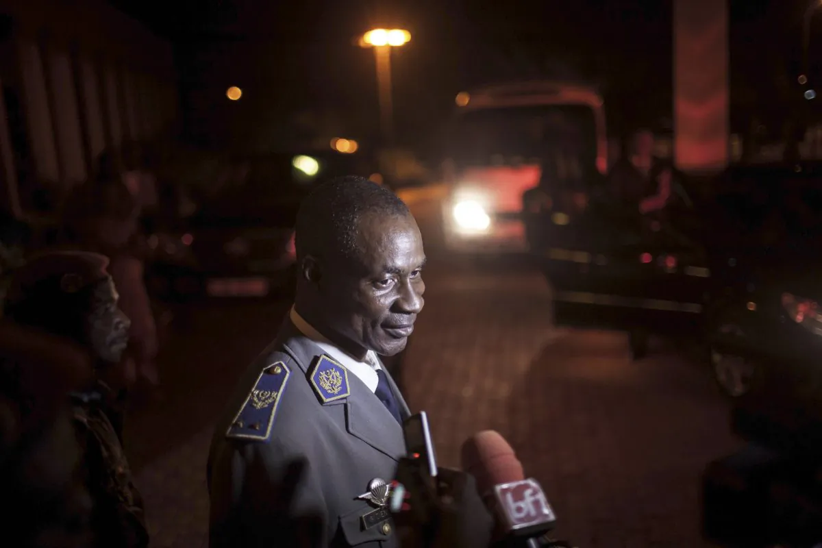 Gen. Gilbert Diendere, who was named leader of Burkina Faso on Thursday, speak to media in Ouagadougou, Burkina Faso, on Sat, Sept. 19, 2015. (AP Photo/Theo Renaut)